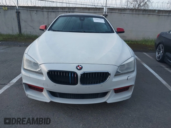 2013 BMW 6 Series 650i with VIN WBAYM9C57DDW20312, listed as a IAAI auction lot 41861212 with 98,662 mi miles and . Bid and sale history available at carsss.com. Image 6.