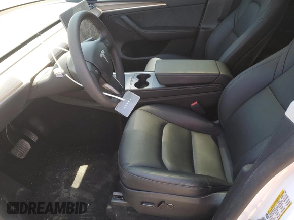 2023 Tesla Model Y Long Range z VIN 7SAYGDEE3PF772663, wystawiony jako Copart lot #56470455 z przebiegiem 50 705 mil mil oraz Czysty tytuł • Clean title. Historia ofert i sprzedaży dostępna na DreamBid. Obrazek 7.