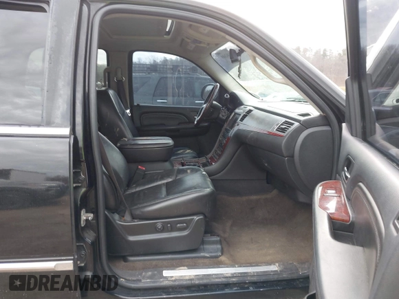 2009 Cadillac Escalade z VIN 1GYFK13269R147563, wystawiony jako IAAI lot #41462689 z przebiegiem 210 095 mil mil oraz . Historia ofert i sprzedaży dostępna na DreamBid. Obrazek 5.