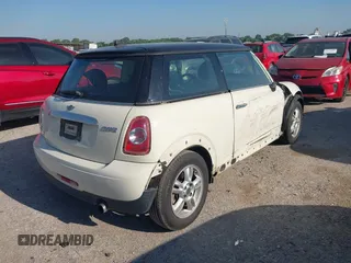 2013 MINI Hardtop with VIN WMWSU3C56DT681952, listed as a IAAI auction lot 42325521 with 124,405 mi miles and . Bid and sale history available at DreamBid. Image 4.