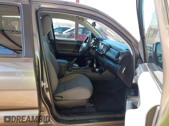 2021 Toyota Tacoma SR z VIN 5TFAX5GN0MX193133, wystawiony jako IAAI lot #41758415 z przebiegiem 25 827 mil mil oraz . Historia ofert i sprzedaży dostępna na DreamBid. Obrazek 5.