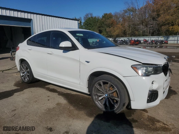 2018 BMW X4 M40i with VIN 5UXXW7C53J0W63768, listed as a Copart auction lot 83899554 with NaN miles and Salvage Title. Bid and sale history available at carsss.com. Image 4.