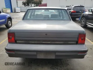 1988 Oldsmobile Cutlass z VIN 2G3AJ5133J2335499, wystawiony jako Copart lot #44587035 z przebiegiem 90 432 mil mil oraz Tytuł czysty. Historia ofert i sprzedaży dostępna na DreamBid. Obrazek 6.