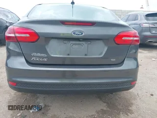2018 Ford Focus SE z VIN 1FADP3F23JL321768, wystawiony jako IAAI lot #42415788 z przebiegiem 124 126 mil mil oraz . Historia ofert i sprzedaży dostępna na DreamBid. Obrazek 16.