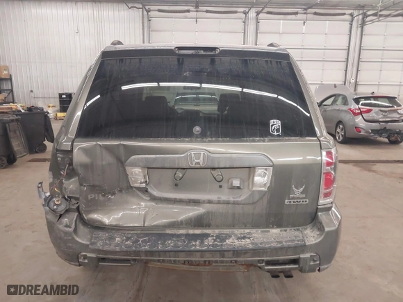 2007 Honda Pilot EX-L with VIN 2HKYF18767H538207, listed as a IAAI auction lot 41747624 with 214,026 mi miles. Bid and sale history available at carsss.com. Image 17.
