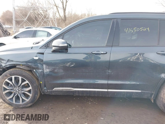 2021 Cadillac XT6 AWD Sport with VIN 1GYKPHRS9MZ104411, listed as a IAAI auction lot 41550524 with 32,140 mi miles. Bid and sale history available at carsss.com. Image 14.