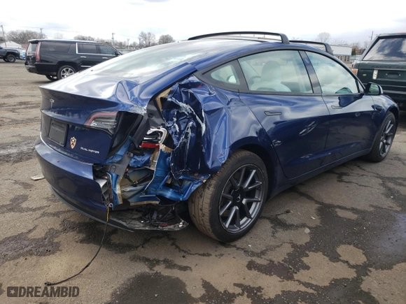 2022 Tesla Model 3 Long Range with VIN 5YJ3E1EB0NF104060, listed as a Copart auction lot 52194345 with 37,996 mi miles and Salvage Title. Bid and sale history available at carsss.com. Image 3.