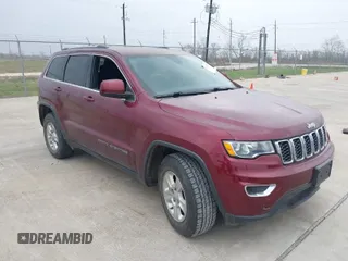 2017 Jeep Grand Cherokee Laredo with VIN 1C4RJEAG5HC780326, listed as a IAAI auction lot 41743223 with 73,675 mi miles. Bid and sale history available at carsss.com. Image 1.