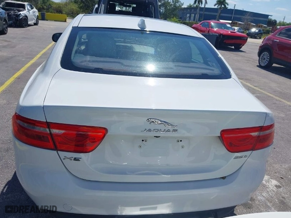 2018 Jaguar XE 25t Premium with VIN SAJAD4FX1JCP24088, listed as a IAAI auction lot 42045360 with 80,156 mi miles. Bid and sale history available at carsss.com. Image 16.