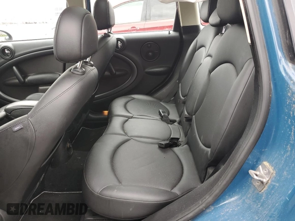 2012 MINI Countryman S with VIN WMWZC3C57CWL86423, listed as a Copart auction lot 57584195 with 102,184 mi miles and Salvage title. Bid and sale history available at DreamBid. Image 10.