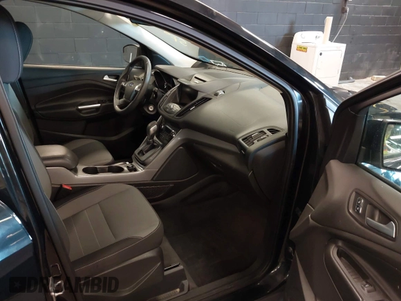2014 Ford Escape SE with VIN 1FMCU0GX6EUE31877, listed as a IAAI auction lot 42080730 with 71,251 mi miles. Bid and sale history available at carsss.com. Image 5.