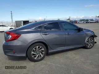 2018 Honda Civic EX с VIN 2HGFC2F71JH519669, выставлен на аукционе Copart как лот 47283725 с пробегом 130 590 миль миль и Списание • Salvage title. История ставок и продаж доступна на DreamBid. Изображение 3.