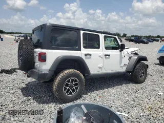 2024 Jeep Wrangler Rubicon z VIN 1C4PJXFG9RW336006, wystawiony jako Copart lot #60237785 z przebiegiem 24 571 mil mil oraz Czysty tytuł • Clean title. Historia ofert i sprzedaży dostępna na DreamBid. Obrazek 3.