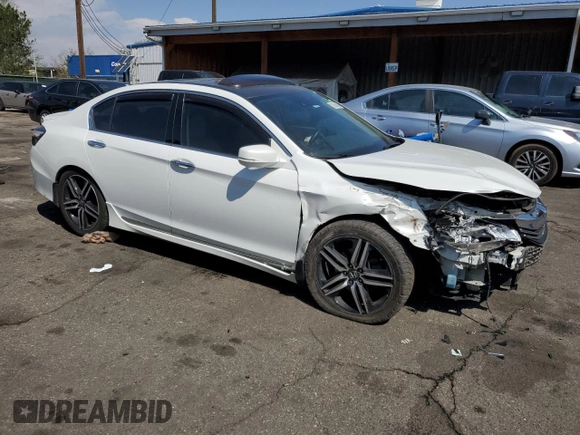 2017 Honda Accord Touring with VIN 1HGCR3F98HA021731, listed as a Copart auction lot 53645455 with 130,907 mi miles and Salvage title. Bid and sale history available at DreamBid. Image 4.