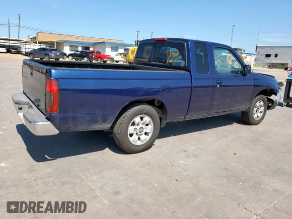 1999 Nissan Frontier XE with VIN 1N6DD26S9XC307893, listed as a Copart auction lot 66045605 with 239,269 mi miles and Salvage title. Bid and sale history available at DreamBid. Image 3.