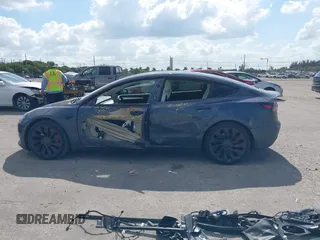 2022 Tesla Model 3 Performance with VIN 5YJ3E1EC9NF201184, listed as a IAAI auction lot 41534959 with 29,389 mi miles and . Bid and sale history available at DreamBid. Image 15.