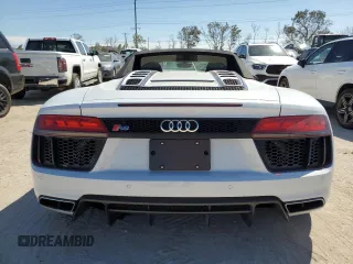2018 Audi R8 z VIN WUAVACFX1J7900121, wystawiony jako Copart lot #75092964 z przebiegiem Nie podano mil oraz Szkody całkowita. Historia ofert i sprzedaży dostępna na DreamBid. Obrazek 10.