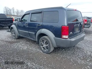 2008 Dodge Nitro SXT with VIN 1D8GU28K18W165005, listed as a IAAI auction lot 41904859 with 171,029 mi miles. Bid and sale history available at carsss.com. Image 3.