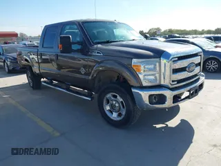2015 Ford Super Duty F-250 SRW Lariat with VIN 1FT7W2BT2FED65128, listed as a IAAI auction lot 41037435 with 115,687 mi miles. Bid and sale history available at carsss.com. Image 1.