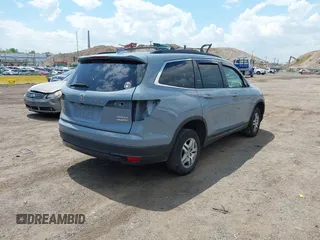 2022 Honda Pilot Special Edition with VIN 5FNYF6H27NB104990, listed as a IAAI auction lot 42219770 with 23,200 mi miles and . Bid and sale history available at DreamBid. Image 4.
