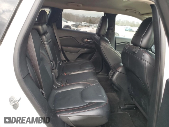 2015 Jeep Cherokee Trailhawk z VIN 1C4PJMBB1FW528766, wystawiony jako Copart lot #46879355 z przebiegiem 248 676 mil mil oraz Szkoda całkowita • Salvage title. Historia ofert i sprzedaży dostępna na DreamBid. Obrazek 11.