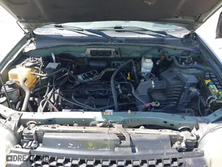 2005 Ford Escape XLS Value with VIN 1FMYU92Z75DA03268, listed as a IAAI auction lot 42051311 with 124,985 mi miles. Bid and sale history available at carsss.com. Image 10.