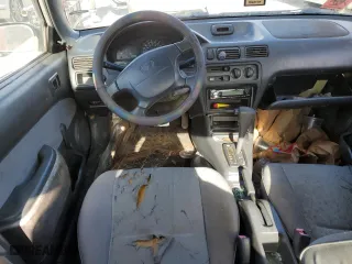 1997 Toyota Tercel DX with VIN JT2BC52L5V0215622, listed as a Copart auction lot 87475544 with 382,242 mi miles and Salvage Title. Bid and sale history available at carsss.com. Image 8.