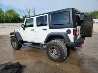 2015 Jeep Wrangler Unlimited Rubicon with VIN 1C4BJWFGXFL518301, listed as a Copart auction lot 61910775 with 153,945 mi miles and Clean title. Bid and sale history available at DreamBid. Image 2.