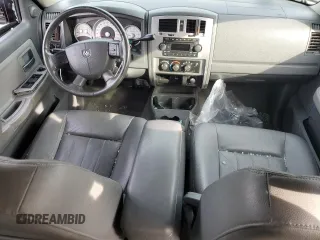 2005 Dodge Dakota Laramie with VIN 1D7HW58N25S204671, listed as a Copart auction lot 83838314 with 122,540 mi miles and Salvage Title. Bid and sale history available at DreamBid. Image 8.