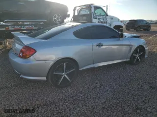 2004 Hyundai Tiburon GT with VIN KMHHN65F44U130202, listed as a Copart auction lot 43193404 with 207,694 mi miles and Salvage Title. Bid and sale history available at carsss.com. Image 3.