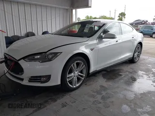 2014 Tesla Model S 60 with VIN 5YJSA1S16EFP53350, listed as a IAAI auction lot 42239753 with 104,985 mi miles and . Bid and sale history available at DreamBid. Image 19.