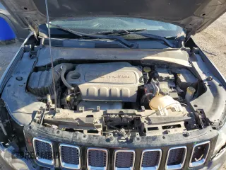 2018 Jeep Compass Sport with VIN 3C4NJCAB7JT250795, listed as a Copart auction lot 48939925 with 144,823 mi miles and Salvage Title. Bid and sale history available at carsss.com. Image 11.