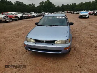 1995 Toyota Corolla DX with VIN 2T1AE09B5SC127586, listed as a Copart auction lot 57075045 with 244,969 mi miles and Salvage title. Bid and sale history available at DreamBid. Image 13.