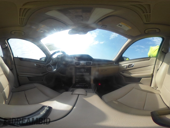 2014 Mercedes-Benz E E 350 Luxury with VIN WDDHF8JB2EA894977, listed as a IAAI auction lot 42065062 with 197,393 mi miles. Bid and sale history available at carsss.com. Image 19.