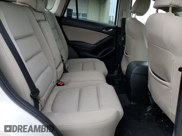 2016 Mazda CX-5 Touring with VIN JM3KE4CY7G0821701, listed as a Copart auction lot 43805495 with 144,416 mi miles and Salvage Title. Bid and sale history available at carsss.com. Image 11.