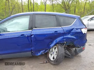 2015 Ford Escape SE z VIN 1FMCU9GX0FUB23447, wystawiony jako IAAI lot #42219379 z przebiegiem 113 274 mil mil oraz . Historia ofert i sprzedaży dostępna na DreamBid. Obrazek 6.