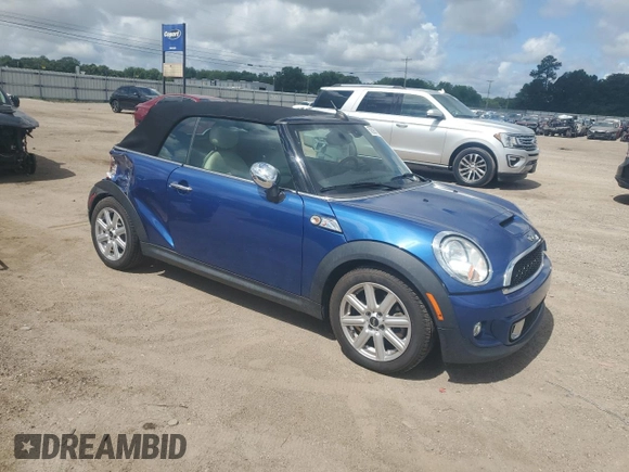 2015 MINI Convertible S with VIN WMWZP3C59F2A91231, listed as a Copart auction lot 59296415 with 31,642 mi miles and Salvage title. Bid and sale history available at DreamBid. Image 4.