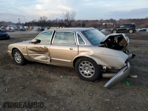 2002 Jaguar XJ 8 with VIN SAJDA14C82LF48116, listed as a Copart auction lot 86444224 with Not provided miles and Salvage title. Bid and sale history available at DreamBid. Image 2.