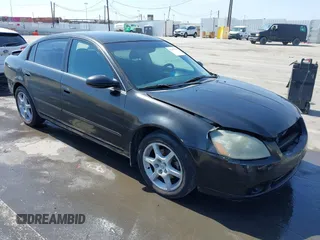 2005 Nissan Altima SE-R z VIN 1N4BL11D05C375051, wystawiony jako IAAI lot #42492768 z przebiegiem 213 763 mil mil oraz . Historia ofert i sprzedaży dostępna na DreamBid. Obrazek 1.