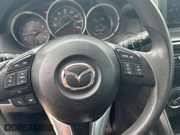 2013 Mazda CX-5 Sport with VIN JM3KE4BE7D0141588, listed as a Copart auction lot 66138585 with 124,920 mi miles and Clean title. Bid and sale history available at DreamBid. Image 12.
