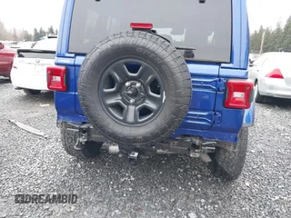 2019 Jeep Wrangler Unlimited Sahara with VIN 1C4HJXEG2KW609315, listed as a IAAI auction lot 41144404 with 55,266 mi miles and . Bid and sale history available at DreamBid. Image 6.
