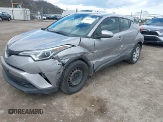 2019 Toyota C-HR XLE with VIN NMTKHMBX7KR079751, listed as a IAAI auction lot 42013399 with 74,665 mi miles. Bid and sale history available at carsss.com. Image 6.