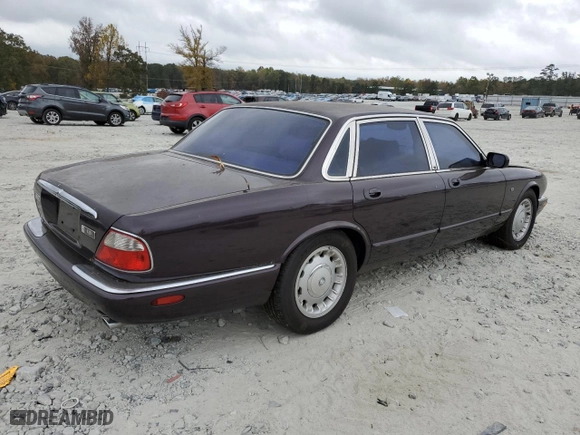 1998 Jaguar XJ with VIN SAJHX1240WC822861, listed as a Copart auction lot 79388654 with 120,568 mi miles and Non Repairable. Bid and sale history available at carsss.com. Image 3.