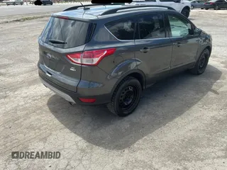 2016 Ford Escape SE with VIN 1FMCU9G91GUB49042, listed as a Copart auction lot 56257705 with 235,024 mi miles and Clean Title. Bid and sale history available at DreamBid. Image 4.