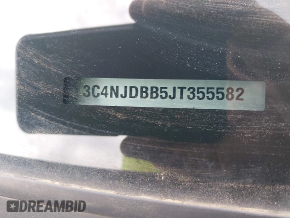 2018 Jeep Compass Latitude with VIN 3C4NJDBB5JT355582, listed as a IAAI auction lot 42351818 with 75,324 mi miles and . Bid and sale history available at DreamBid. Image 9.