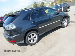 2007 Lexus RX 350 with VIN JTJGK31U970002140, listed as a IAAI auction lot 41939945 with 163,969 mi miles. Bid and sale history available at carsss.com. Image 4.