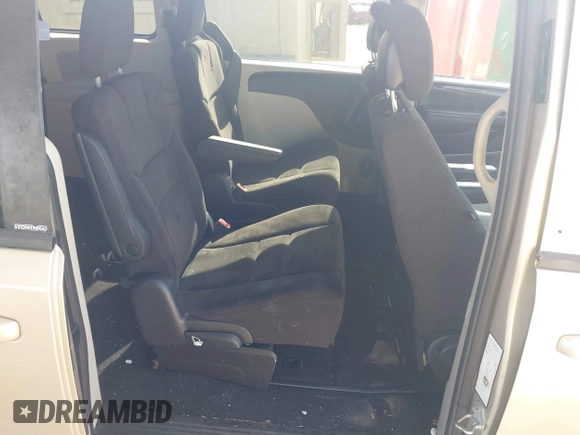 2014 Dodge Grand Caravan SXT with VIN 2C4RDGCG8ER244201, listed as a IAAI auction lot 42017091 with 161,653 mi miles and . Bid and sale history available at DreamBid. Image 8.