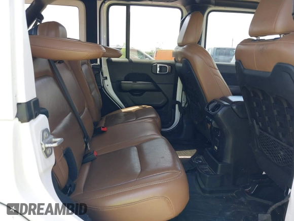 2018 Jeep Wrangler Unlimited Sahara z VIN 1C4HJXEG0JW245118, wystawiony jako IAAI lot #42066614 z przebiegiem 83 743 mil mil oraz . Historia ofert i sprzedaży dostępna na DreamBid. Obrazek 8.