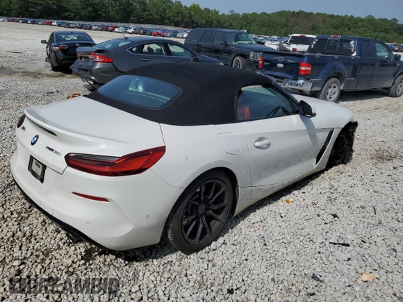 2020 BMW Z4 sDrive30i with VIN WBAHF3C06LWW83982, listed as a Copart auction lot 66076064 with 71,855 mi miles and Salvage Title. Bid and sale history available at carsss.com. Image 3.