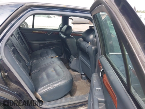 2003 Cadillac DeVille with VIN 1G6KD54Y53U232586, listed as a IAAI auction lot 42071165 with 174,403 mi miles. Bid and sale history available at carsss.com. Image 8.